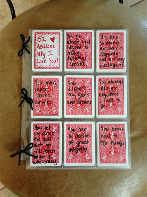 Six Red And White Playing Cards With Words Written On Them Sitting On A