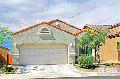 New One Story Ranch Moss Green And Burnt Orange Stucco Home In Tucson