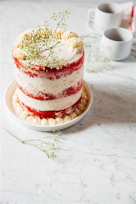 a naked red velvet cake with crème fraîche frosting for a blog birthday