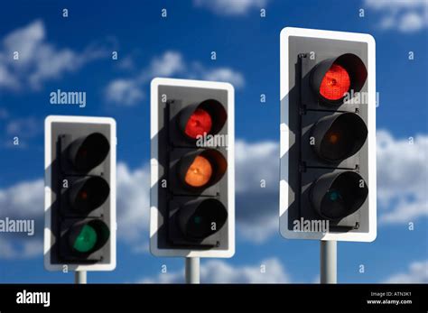 Row Of Three Road Traffic Lights Showing Sequence Of Red Amber And