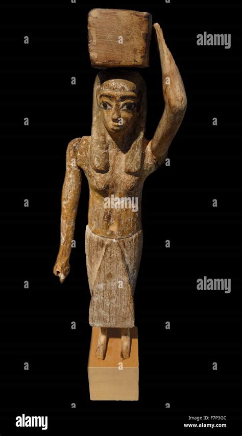 Egyptian Wooden Statue Of A Bearer Of Offerings Middle Kingdom 2040