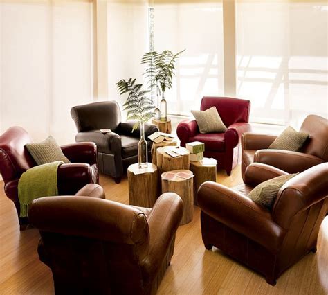 Round tables are those with smoothed. Manhattan Leather Club Chairs grouped around varied height ...