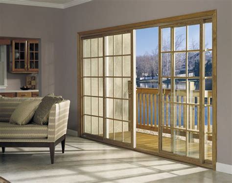 Four Panel Sliding Glass Door In With Sqaure Grids Creates