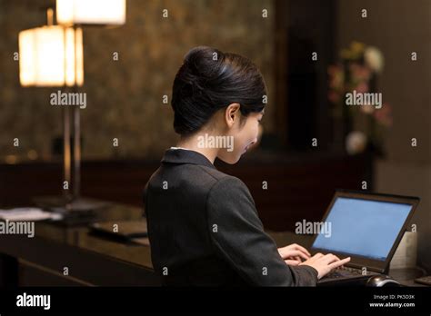 Chinese Woman Hotel Receptionist Hi Res Stock Photography And Images