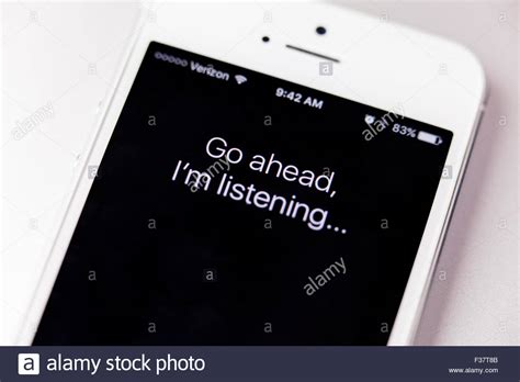 Go Ahead Im Listening Message By Siri On Iphone Screen Usa Stock Photo Alamy