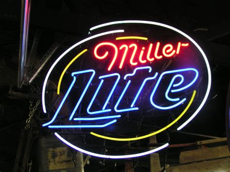 A Neon Sign That Reads Miller Lite