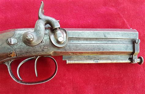 A Very Good Example Of A Double Barrel Overunder Percussion Pistol By