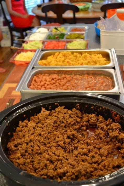 We did a taco bar at my sons graduation party last year & it was great!. The Easiest Way to Feed a Crowd: A Taco Bar