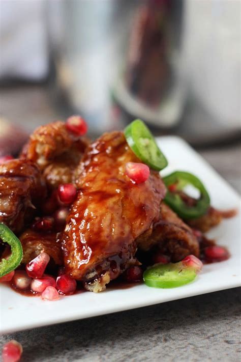 Sticky Baked Chicken Wings With Sweet And Spicy Pomegranate Glaze Baked