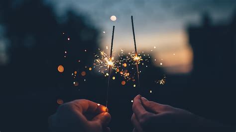 1290x2796px 2k Free Download Two People Holding Sparklers At Dusk