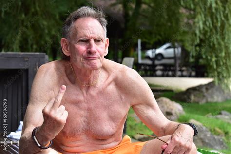 Foto De Angry Shirtless Old Man Giving The Finger Do Stock Adobe Stock