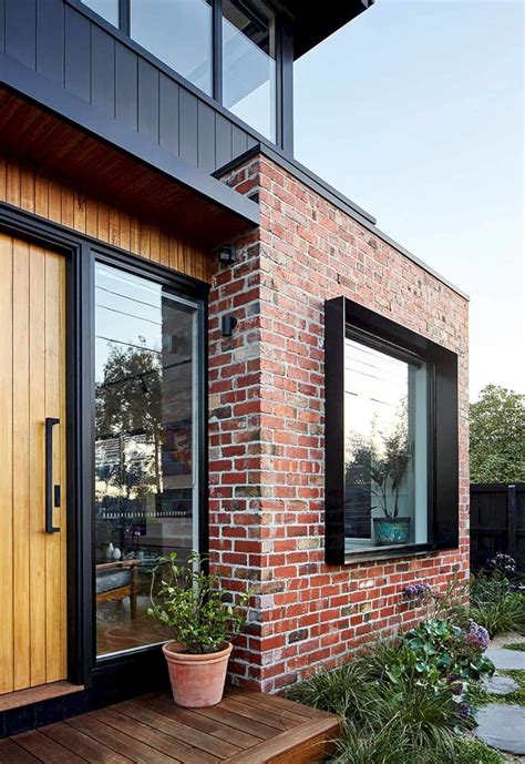 This Residence Also Has A Facade With Large Open Windows To Capture The