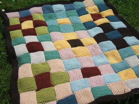 This vibrantly charming knitted patchwork blanket will definitely brighten up your living room. Patchwork blanket | thomasina knits | Flickr