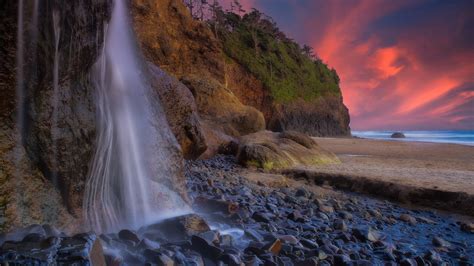 Oregon Pacific Ocean With Rock Stone And Waterfalls During Sunset Hd
