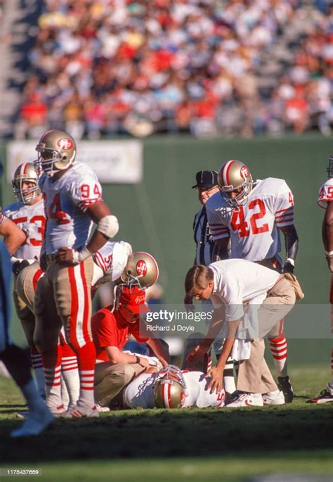 49ers Fs Ronnie Lott Looks Over An Injured Team Mate San Francisco News Photo Getty Images