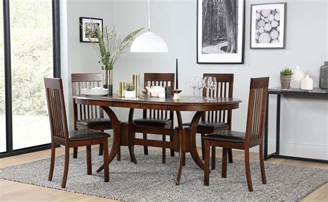 1,237 dark wood dining table products are offered for sale by suppliers on alibaba.com, of. Townhouse Oval Dark Wood Extending Dining Table with 4 ...