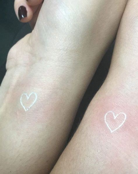 Matching White Ink Heart Tattoos By Mary Heart Tattoo Wrist White