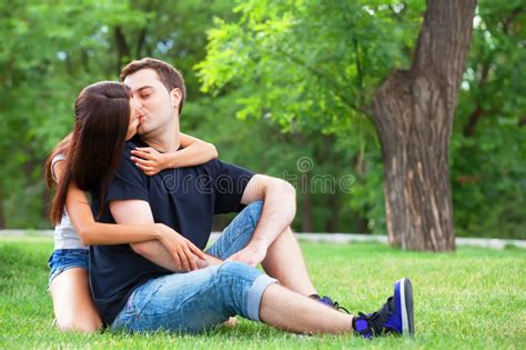 Young Nice Couple Kissing In The Park Stock Image Image Of