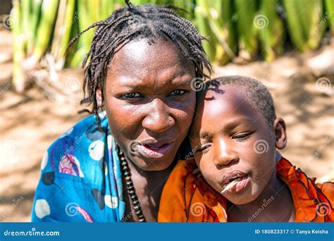 Woman With Small Children Of The Hadzabe Tribe Editorial Photography