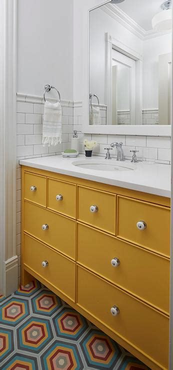 Make a statement by painting a living room or bathroom in one of the many stunning mustard paint options. Mustard Yellow Bath Vanity with Blue and Orange Hex Tiles ...