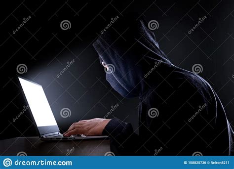 Cybercrime Hacking And Technology Crime Hacker With Laptop Stock