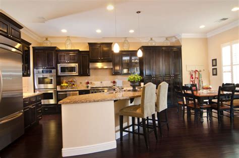 Dark flooring can still work with dark cabinets in a small kitchen, as. 34 Kitchens with Dark Wood Floors (Pictures)