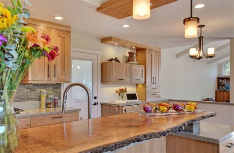 We provide solid birch wood cabinetry. Contemporary Kitchen with Quartz Countertops and Red Birch ...