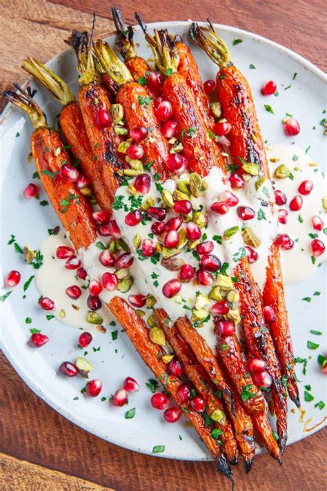 Maple Roasted Carrots In Tahini Sauce With Pomegranate And Pistachios