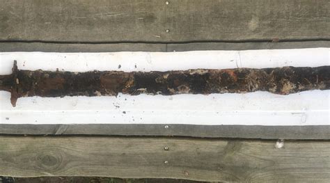 Girl Pulls 1500 Year Old Sword From Swedish Lake Called Queen