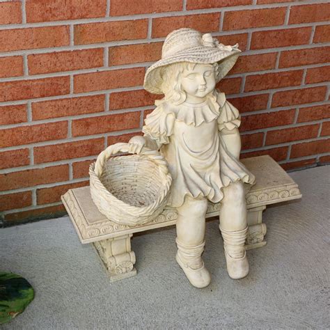 Resin Garden Sculpture Of Girl Holding Basket Late 20th Century Ebth