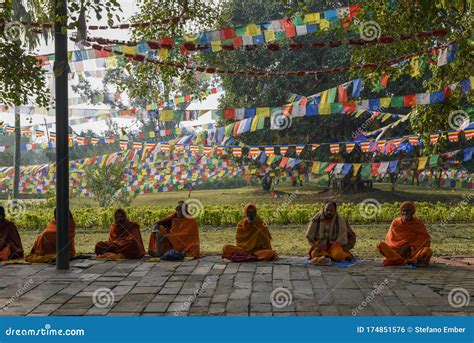Monks Praying At Maya Devi Temple Birth Place Of Buddha In Lumbini On
