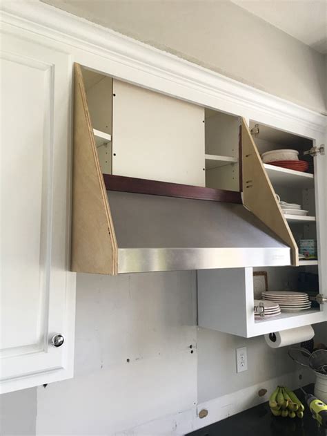 We also plan to add some more moulding along the sides (after the tiling has been completed up to the sides of the fan) as well your custom wood range hood turned out beautifully. DIY Range Hood Cover