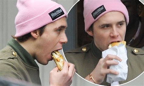 Brooklyn Beckham Tucks Into Baguette During London Day Out Daily Mail