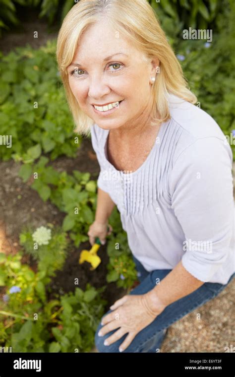 Senior Woman Gardening Stock Photo Alamy