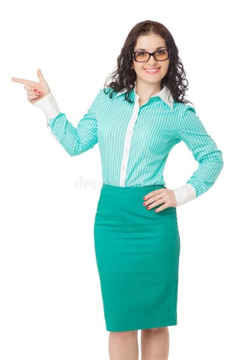 Smiling Slim Brunette Girl In Green Skirt And Blouse Pointing As Stock