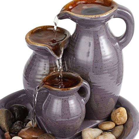 A simple fountain that adds life indoor with that soothing sound of running water. Triple Jug Indoor-Outdoor 8 1/4" High Tabletop Fountain ...