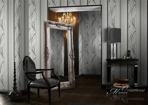 This very large mirror's frame is made from plaster and painted in a metallic silver. Large Silver Floor Mirror \ Large Silver Wall Mirror