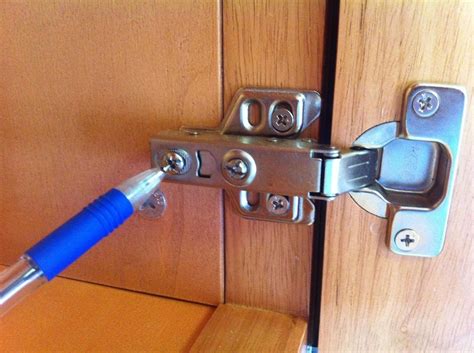 This is a very common problem with an easy soloution. How to Adjust the Alignment of Cabinet Doors ...
