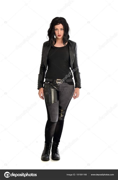 download full length portrait of black haired girl wearing leather outfit standing pose on a