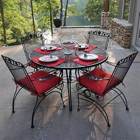 This outdoor bar stool features handmade, wrought iron construction. 25 Best of Wrought Iron Chairs Outdoor