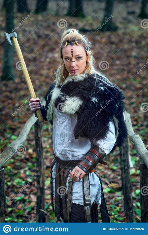 Viking Woman Warrior Fur Collar And Specific Makeup Rising Ax Above