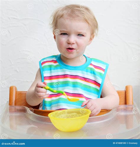 Baby Eating Porridge From Bowl Stock Photo Image Of Baby Diet 47408100