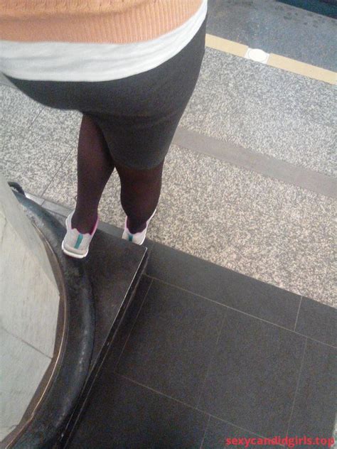 Sexycandidgirlstop Booty In A Skirt And Legs In Pantyhose Subway Station Closeup Photo Item 1