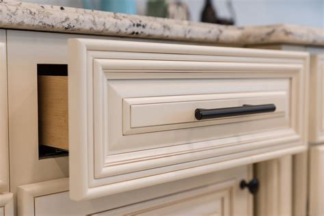 Casselberry Antique White Jgen Cabinets