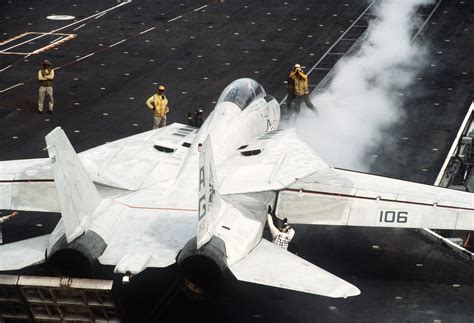 A Fighter Squadron 143 Vf 143 F 14a Tomcat Aircraft Is Positioned On