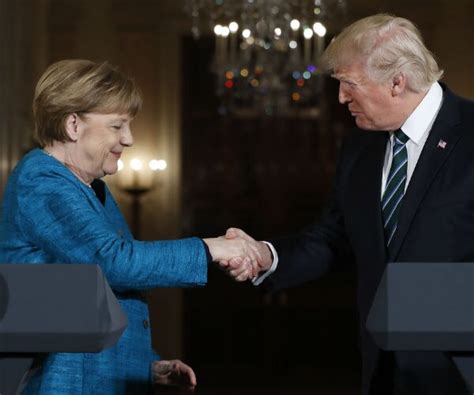 trump and merkel s awkward handshake moment
