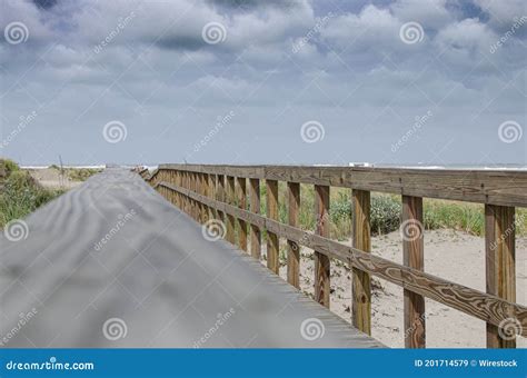 Wooden Pier Near The Ocean Captured On A Sunny Day Stock Image Image