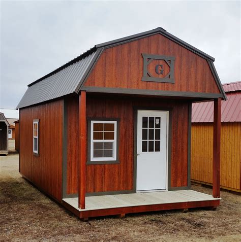 This model has 8' walls, two lofts, metal gambrel roof, and small front porch. 12x24 Lofted Barn Cabin. Dark Brown metal roof. Smart Side Haley Redwood 2 Tone finish with Dark ...