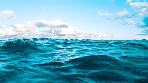 Download Wallpaper 1920x1080 Water Sea Ripples Waves Sky Blue