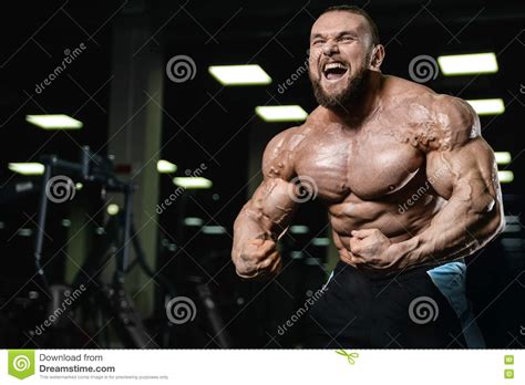 Brutal Strong Bodybuilder Athletic Men Pumping Up Muscles